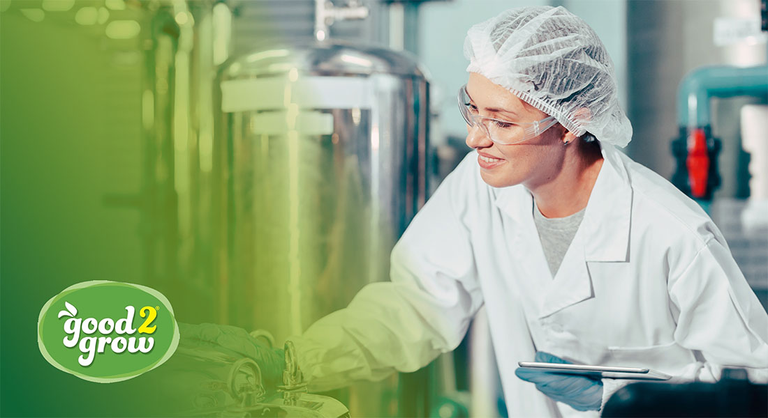 bottling plant employee working on product